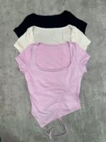 Remera frunce en punta